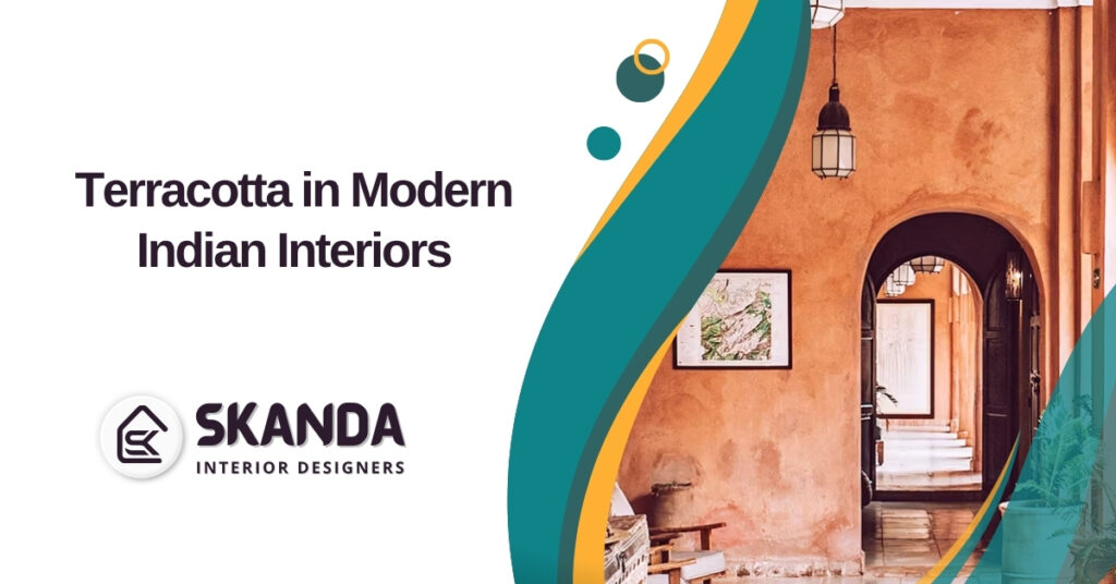 Modern Indian living room with terracotta accent wall, earthy decor, and natural fabrics